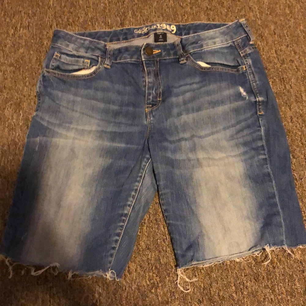 slightly worn jeans (turned into shorts)